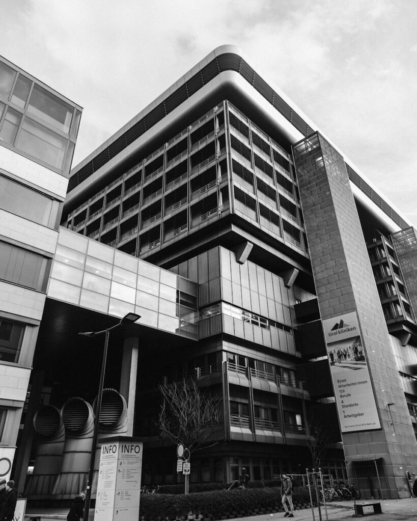 A black and white photo of a large building